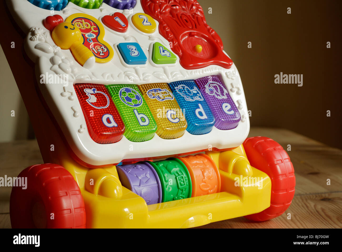 Baby stroller toy on table Stock Photo