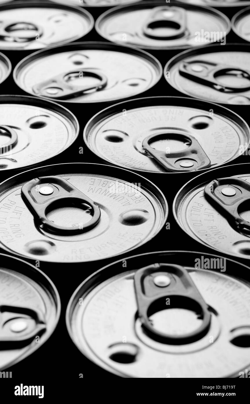 a vertical shallow focus array of tin cans Stock Photo