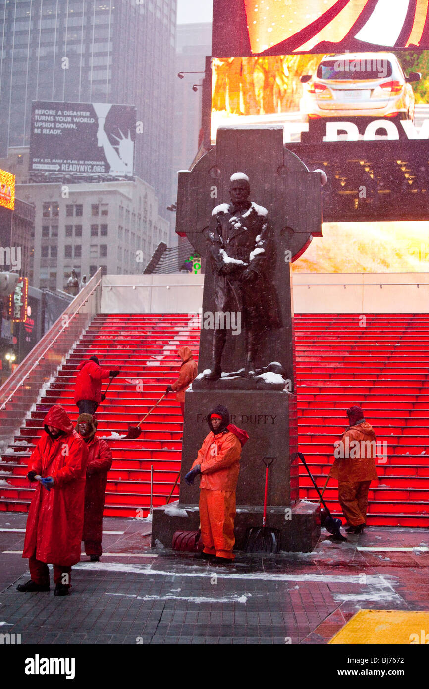 Snow cleanup crew in Times Square, New York City Stock Photo