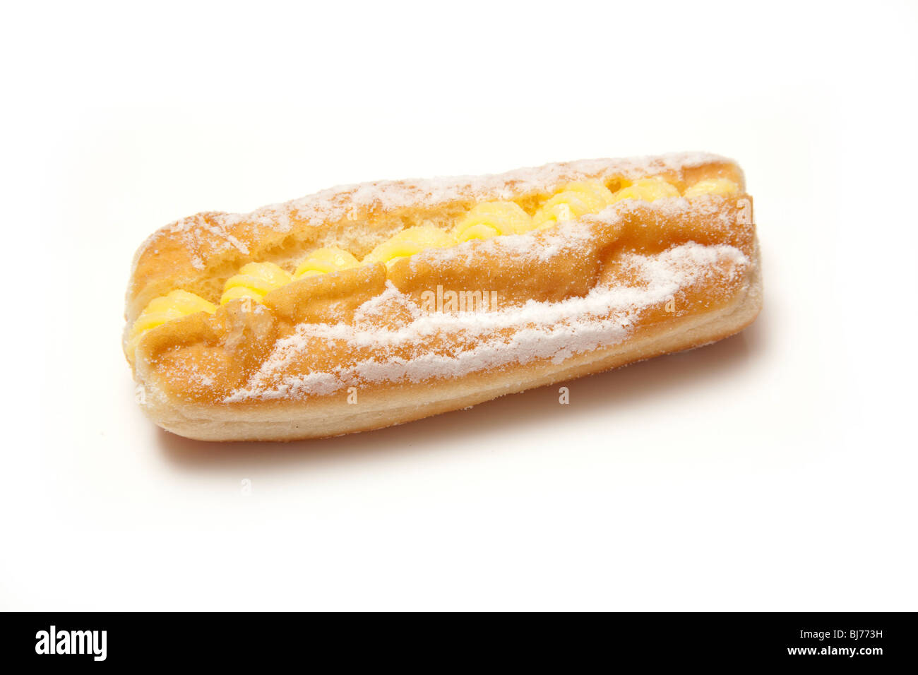 Custard cream donut isolated on a white studio background. Stock Photo