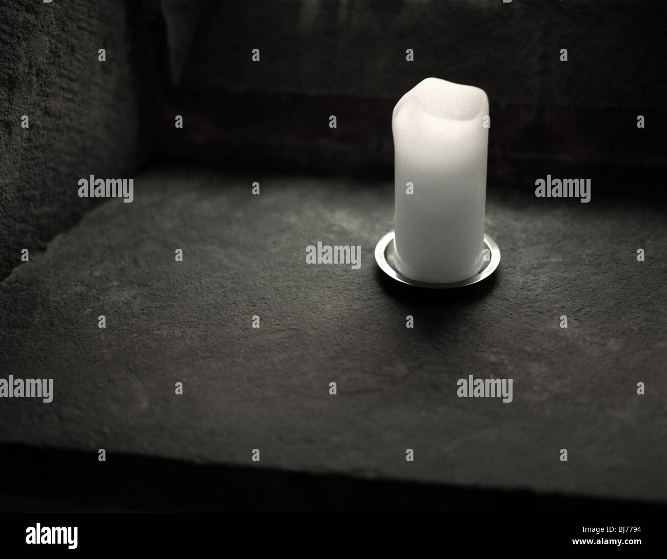 Candle on window sill Stock Photo Alamy