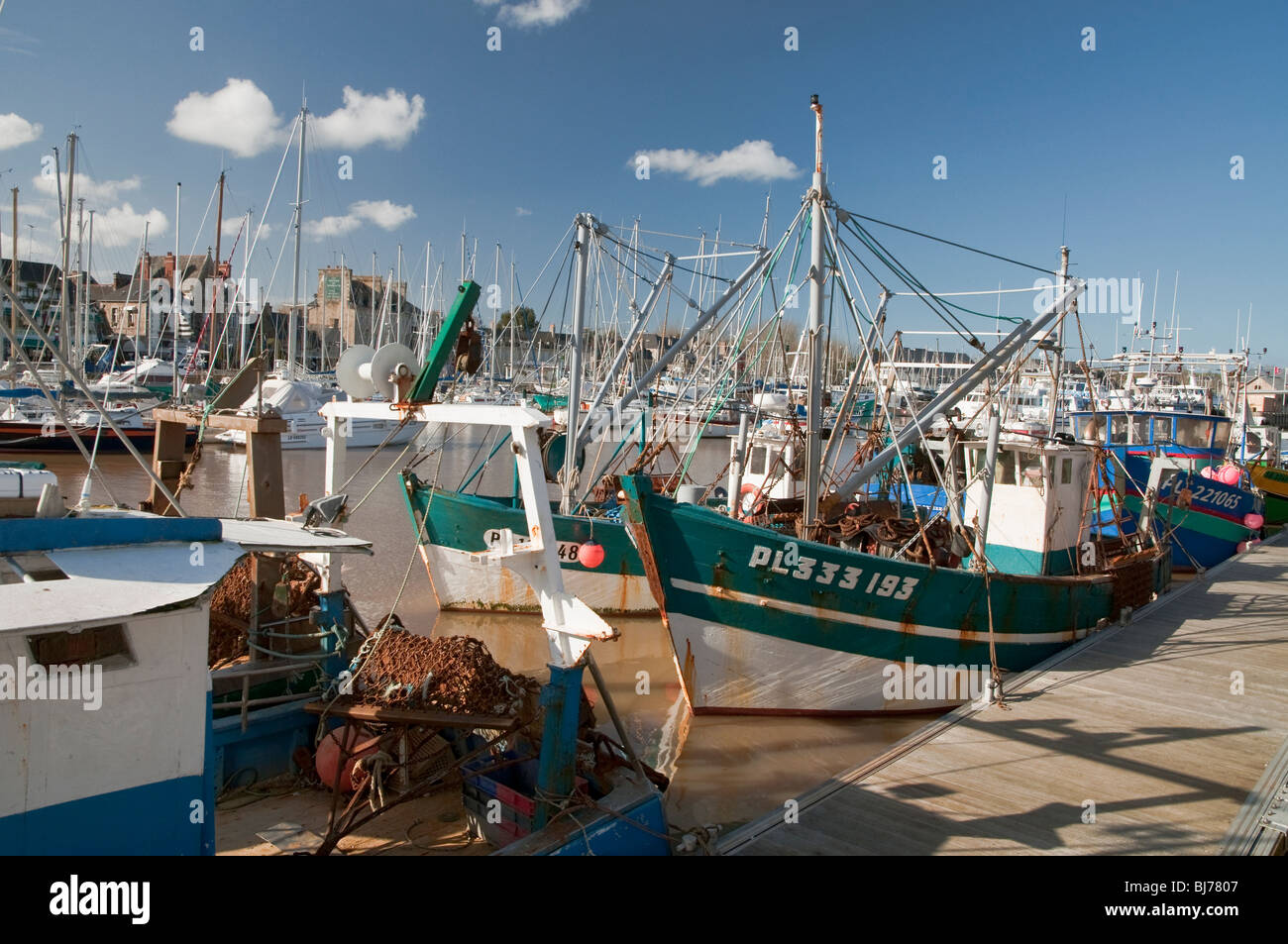 Fishing boats moored at Paimpol harbour in Brittany, France Stock Photo