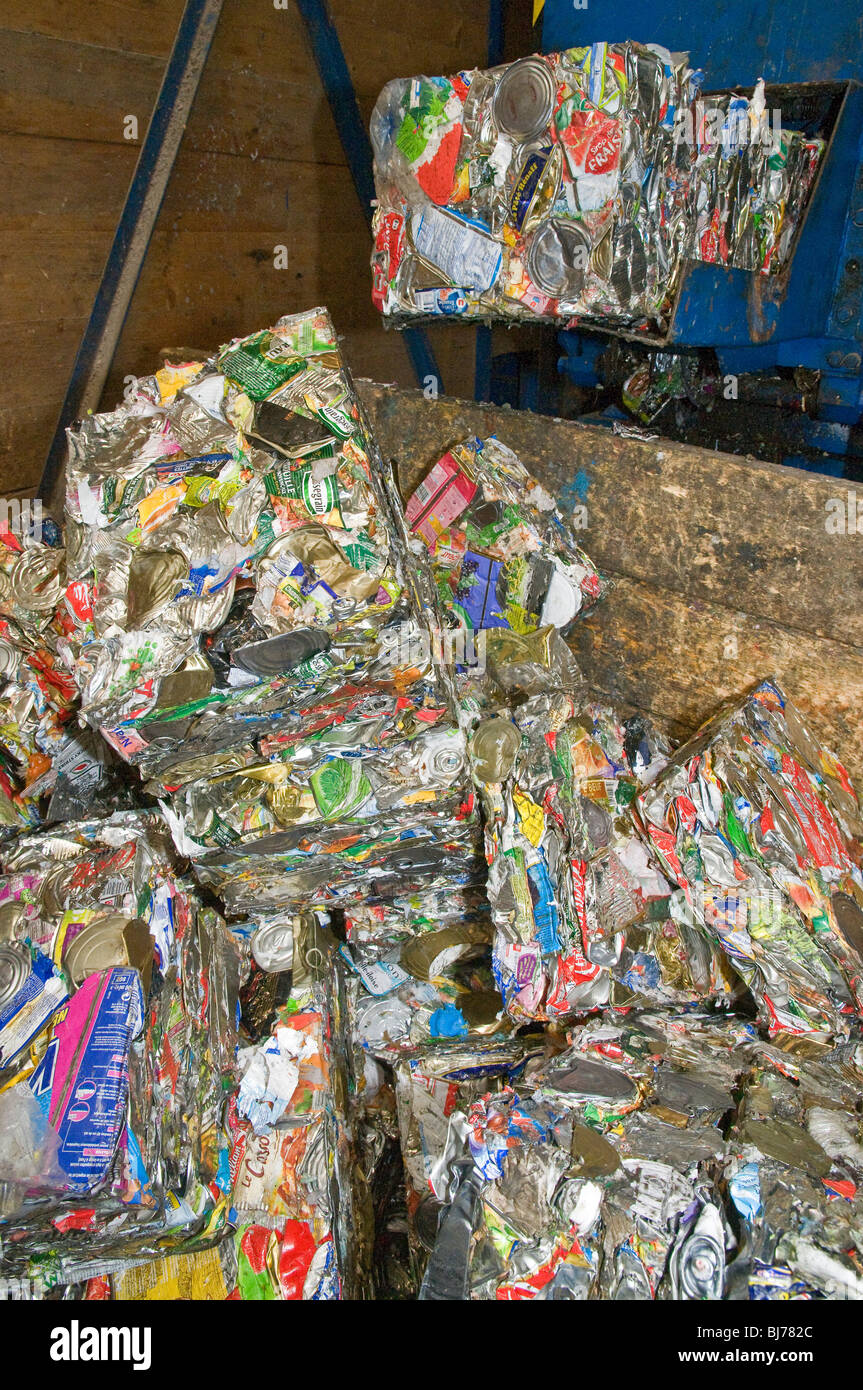 Crushed tin cans in bales in recycling center Stock Photo Alamy