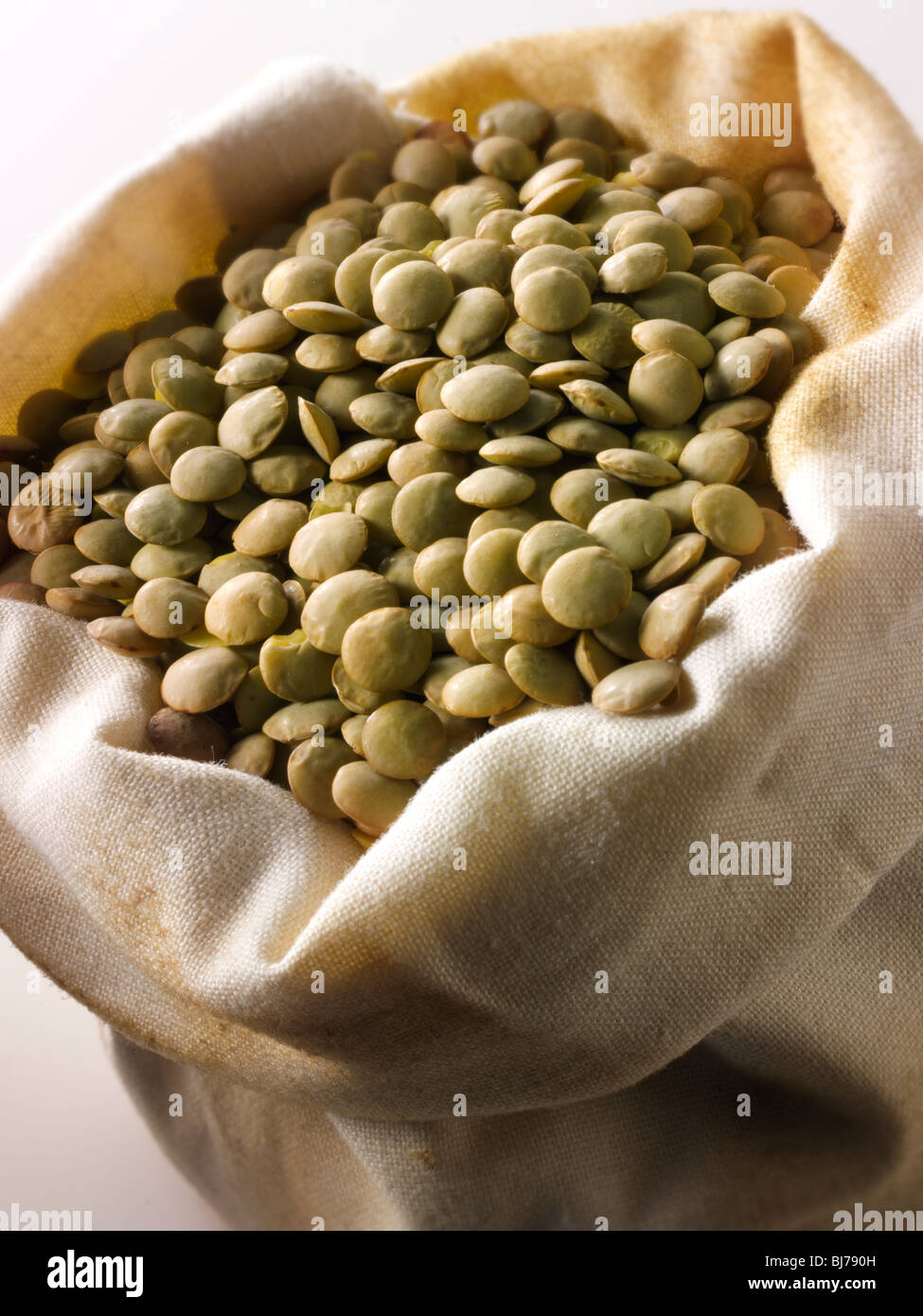 Whole dried green lentil beans - close up full frame top shot  (Vigna radiata) Stock Photo