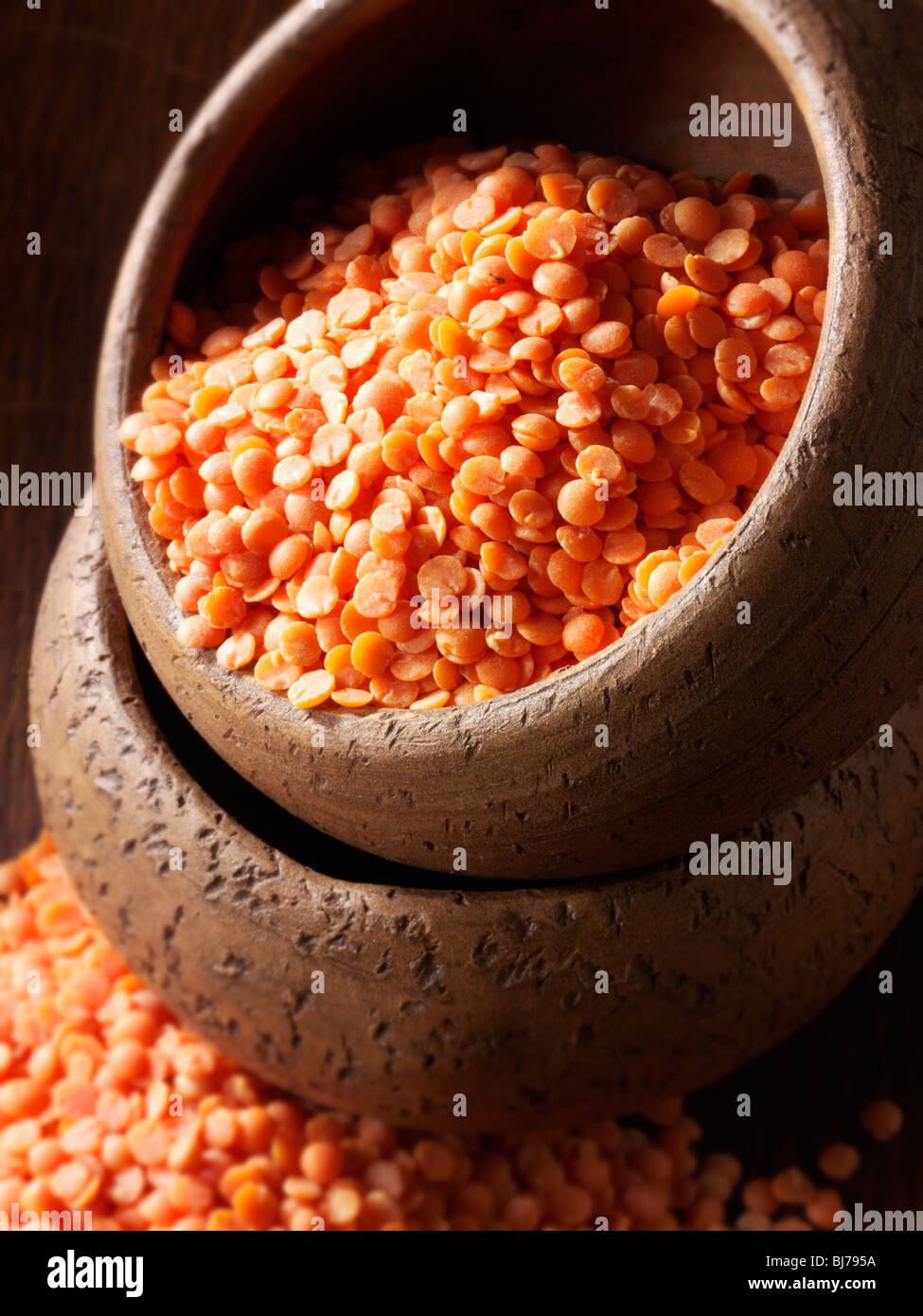 Whole dried orange lentil beans - close up Stock Photo