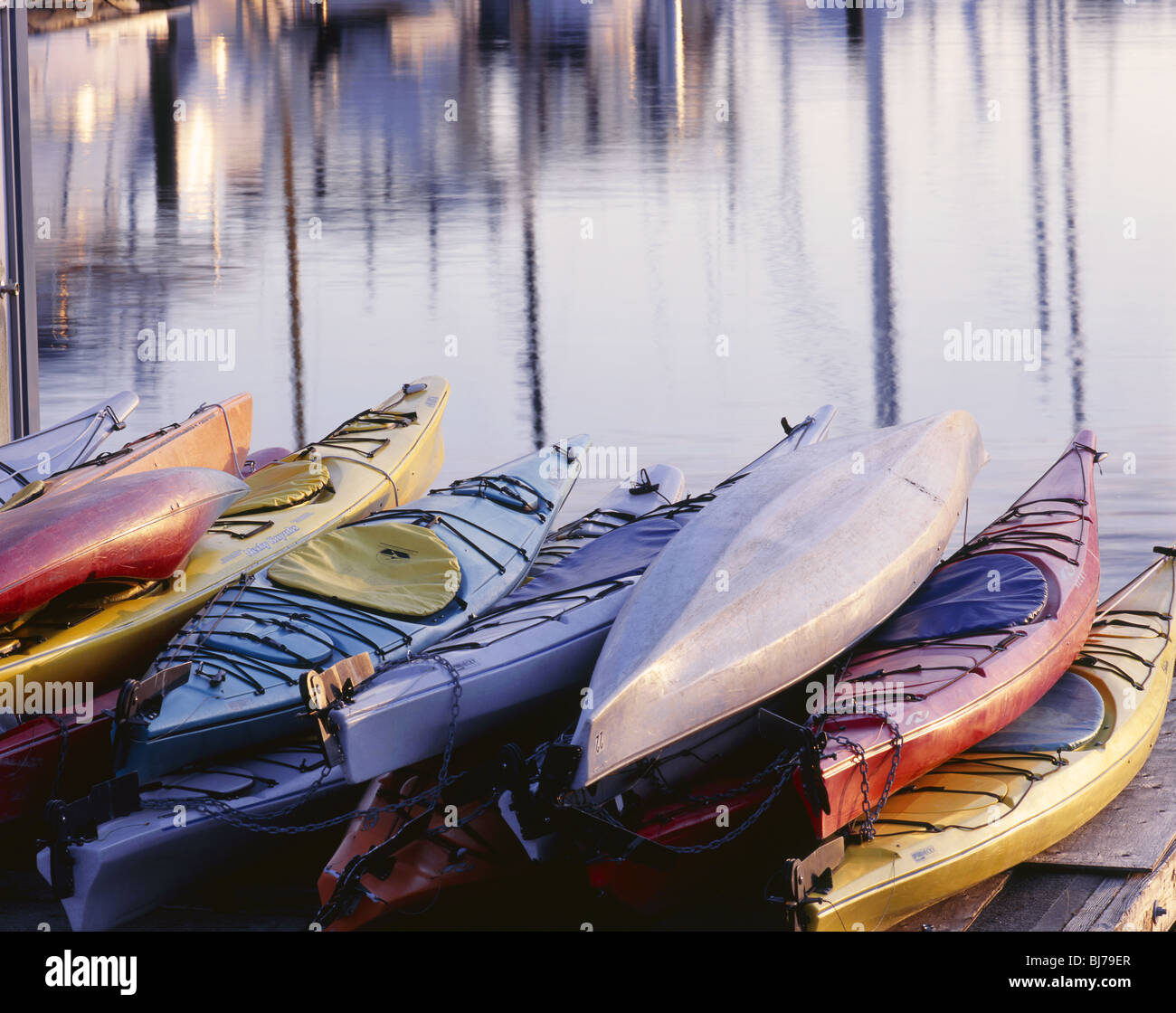 WASHINGTON - Kayaks on the boat dock at Liberty Bay on the Kitsap Peninsula in Poulsbo. Stock Photo