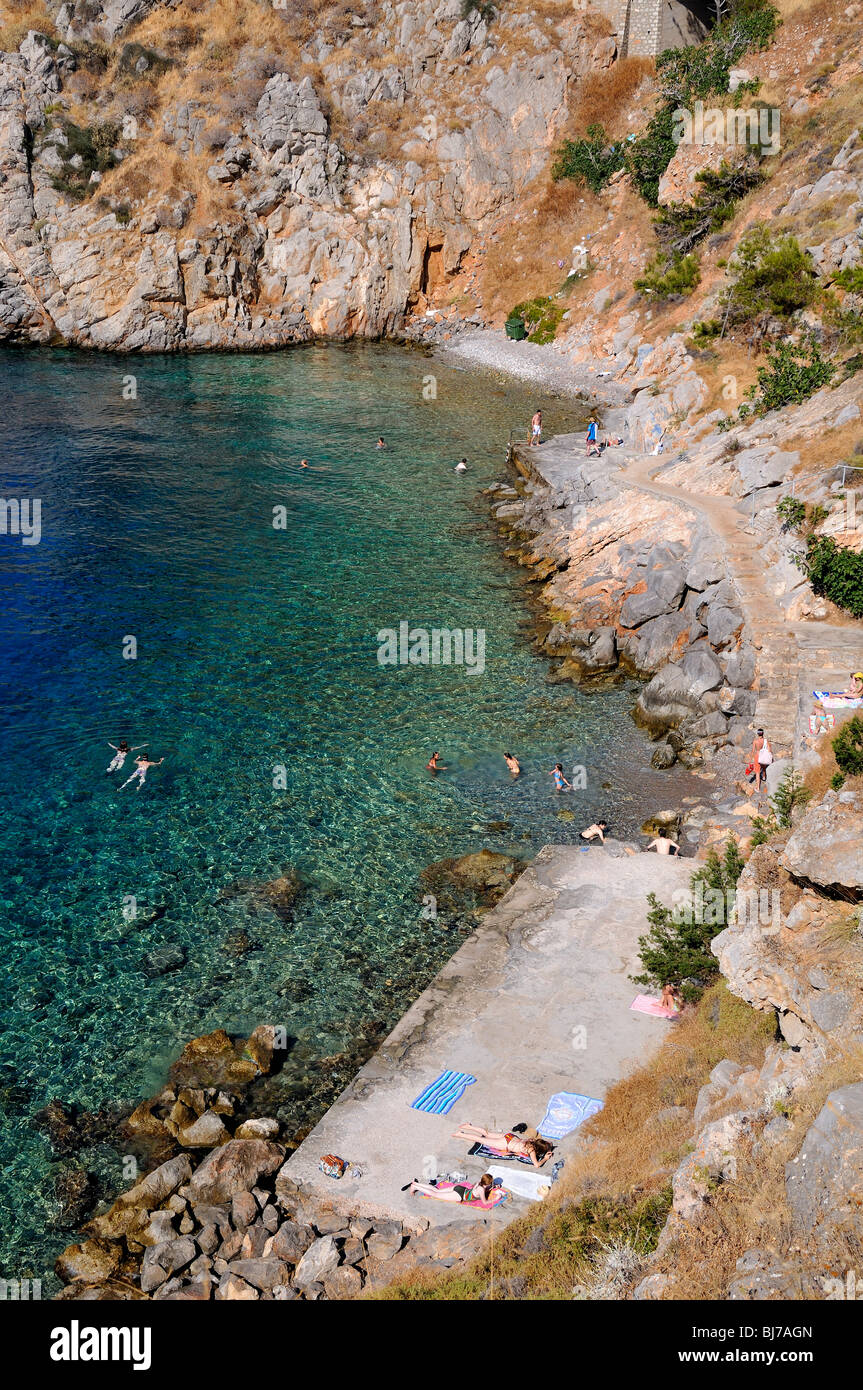Small Beach On The Way To Kaminia Village Hydra Island Greece Stock small-beach-on-the-way-to-kaminia-village-hydra-island-greece-stock