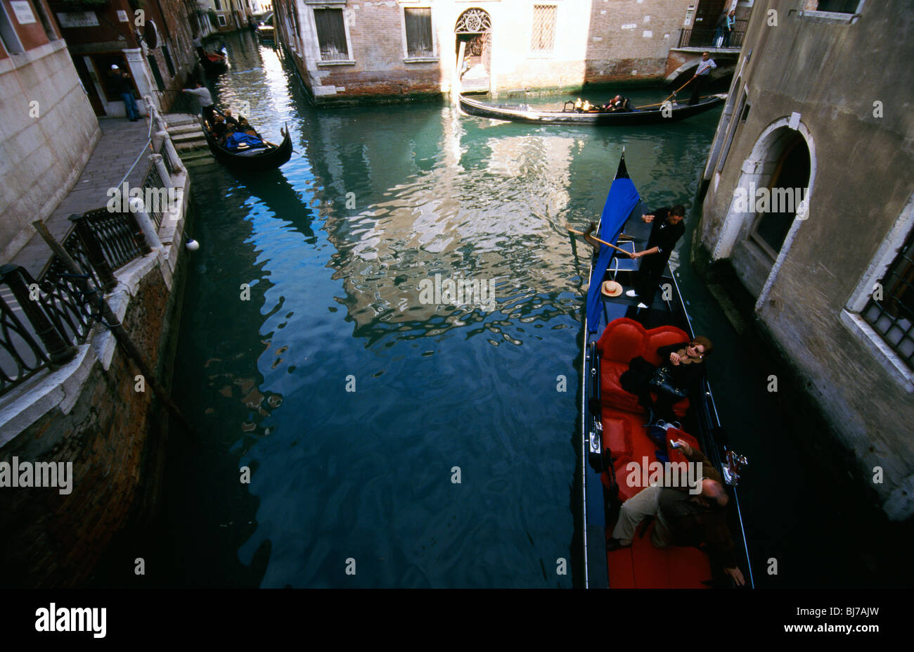 Venice, July 2008 -- Gondolas on the water. Stock Photo