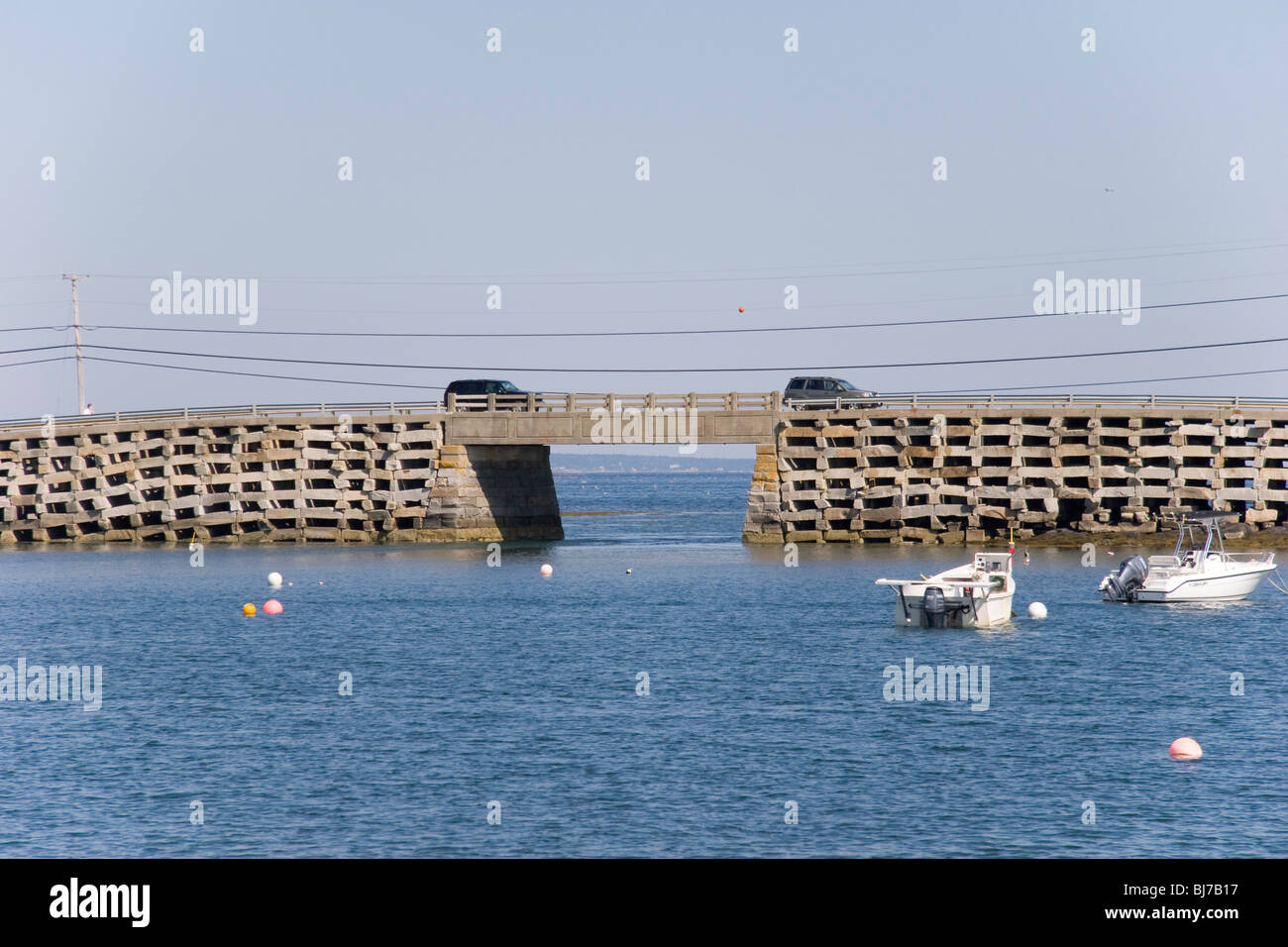 Unique open-cribwork construction of the Bailey Island Bridge allows for free tidal flow beneath Stock Photo