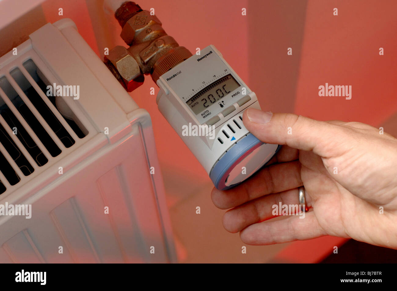 A radiator knob being turned Stock Photo Alamy