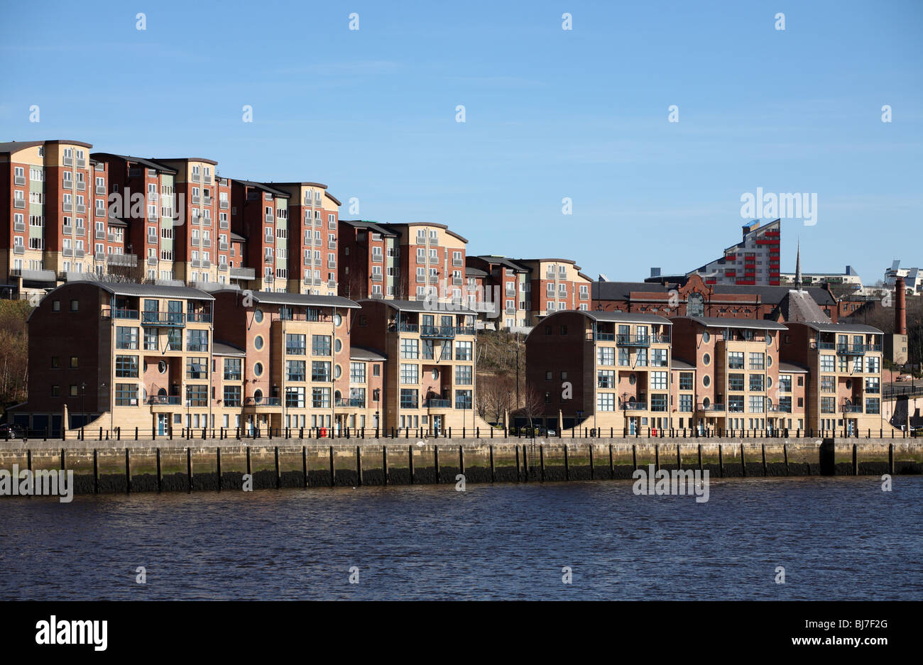 River side development on the north bank of the river Tyne at Newcastle, Byker Wall is visible in the background. Stock Photo