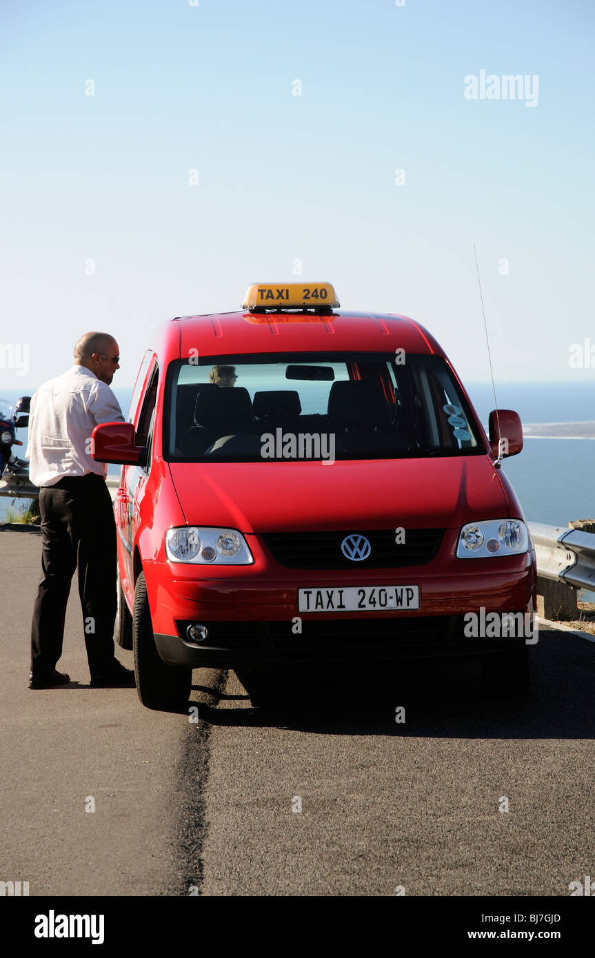 A red taxi showing a taxi number plate Cape Town South Africa Stock Photo