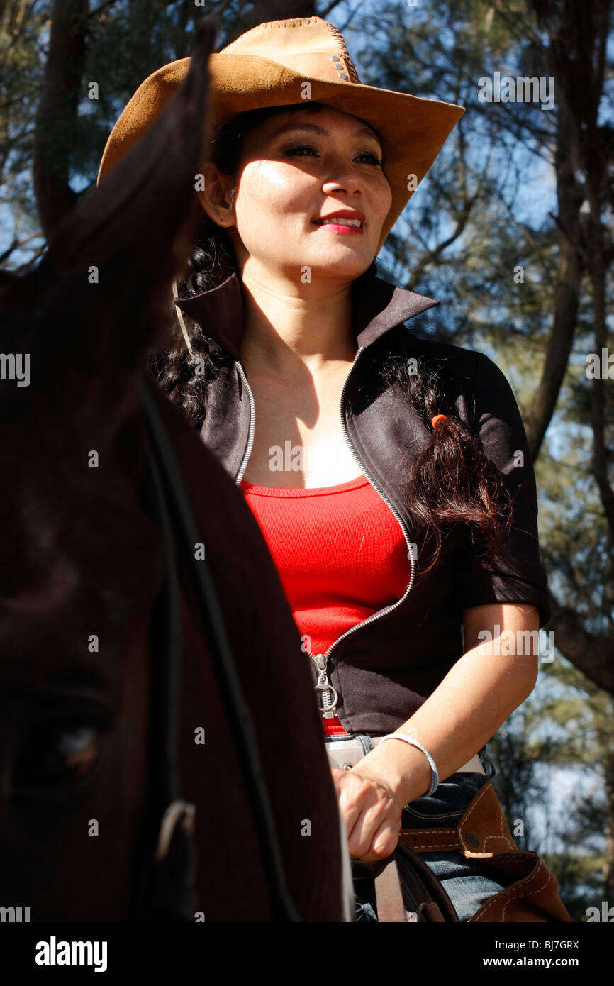 Asian woman wearing cowboy hat hi-res stock photography and images - Alamy
