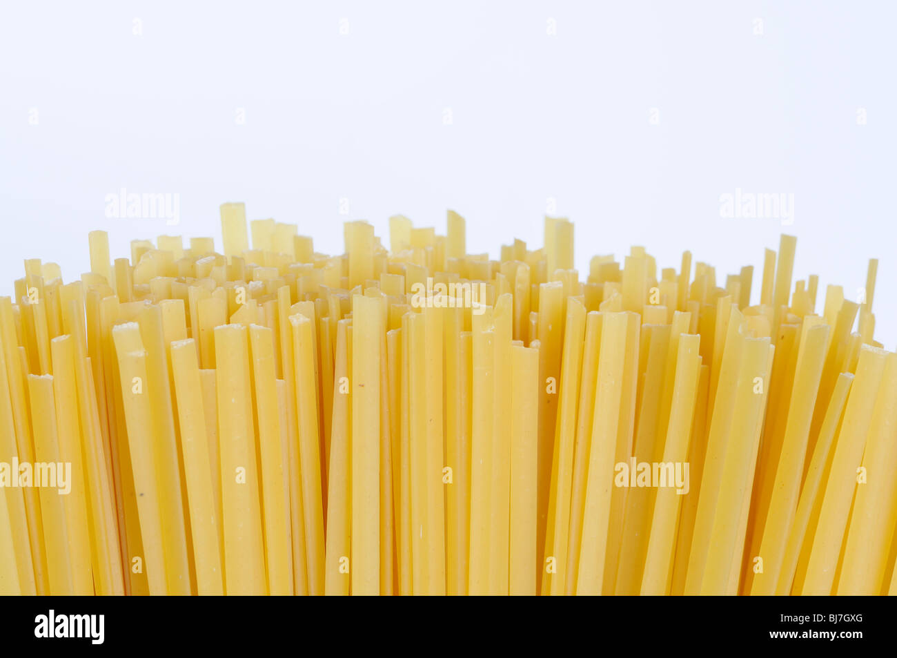 Raw linguine pasta Stock Photo
