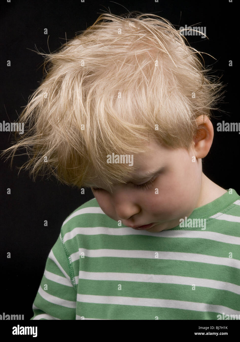 Very Sad Little Boy On Black Background Boy Have Blond Hair
