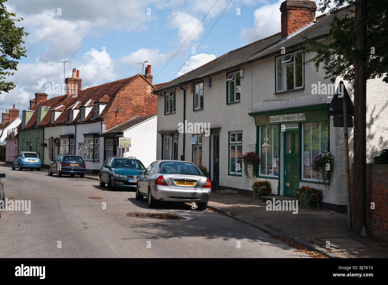 Main village street at BradwellonSea, Essex with community shop Stock