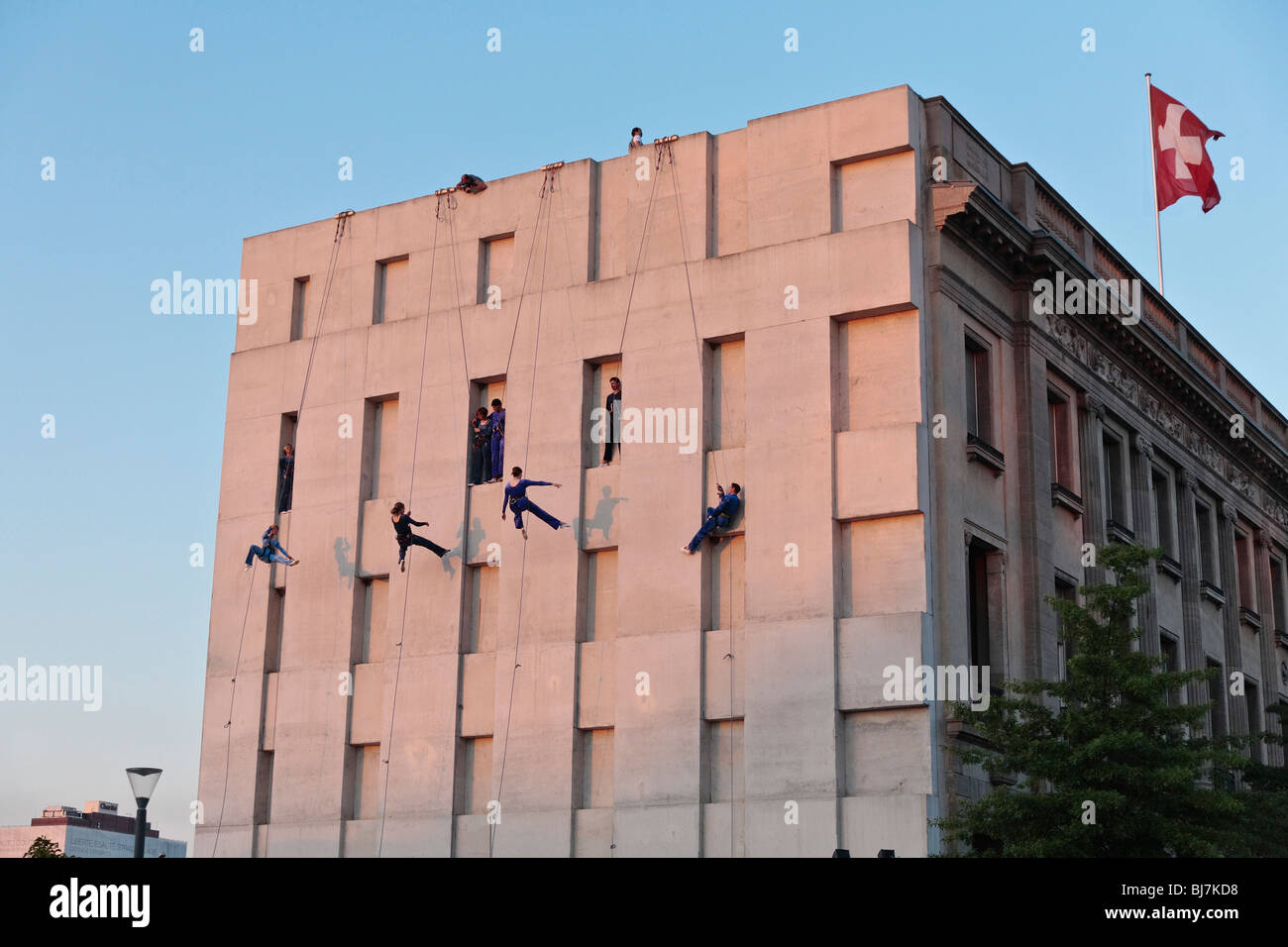 Artists of the Swiss group Compagnie Vertical Danse on the outside wall of the Swiss Embassy in Berlin, Germany, Europe Stock Photo