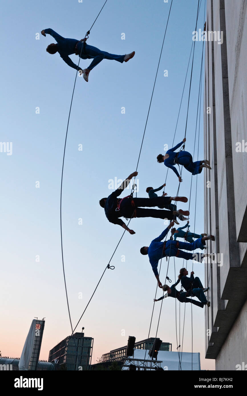 Artists of the Swiss group Compagnie Vertical Danse on the outside wall of the Swiss Embassy in Berlin, Germany, Europe Stock Photo