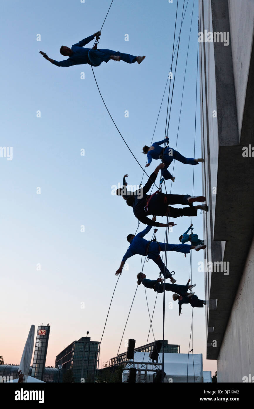 Artists of the Swiss group Compagnie Vertical Danse on the outside wall of the Swiss Embassy in Berlin, Germany, Europe Stock Photo