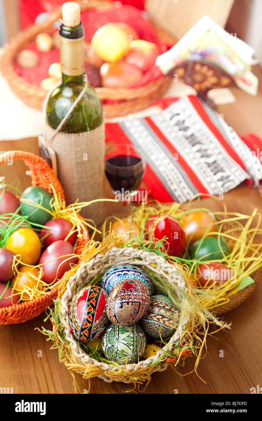 Easter painted eggs with wine glass and bottle Stock Photo Alamy
