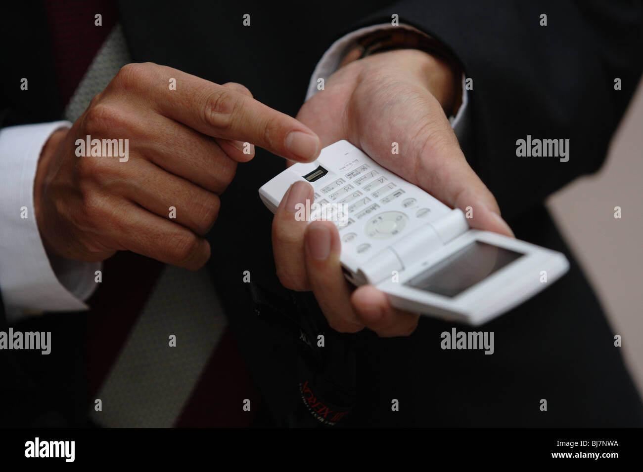 Japanese mobile telephone use by commuters and public in Tokyo, Japan