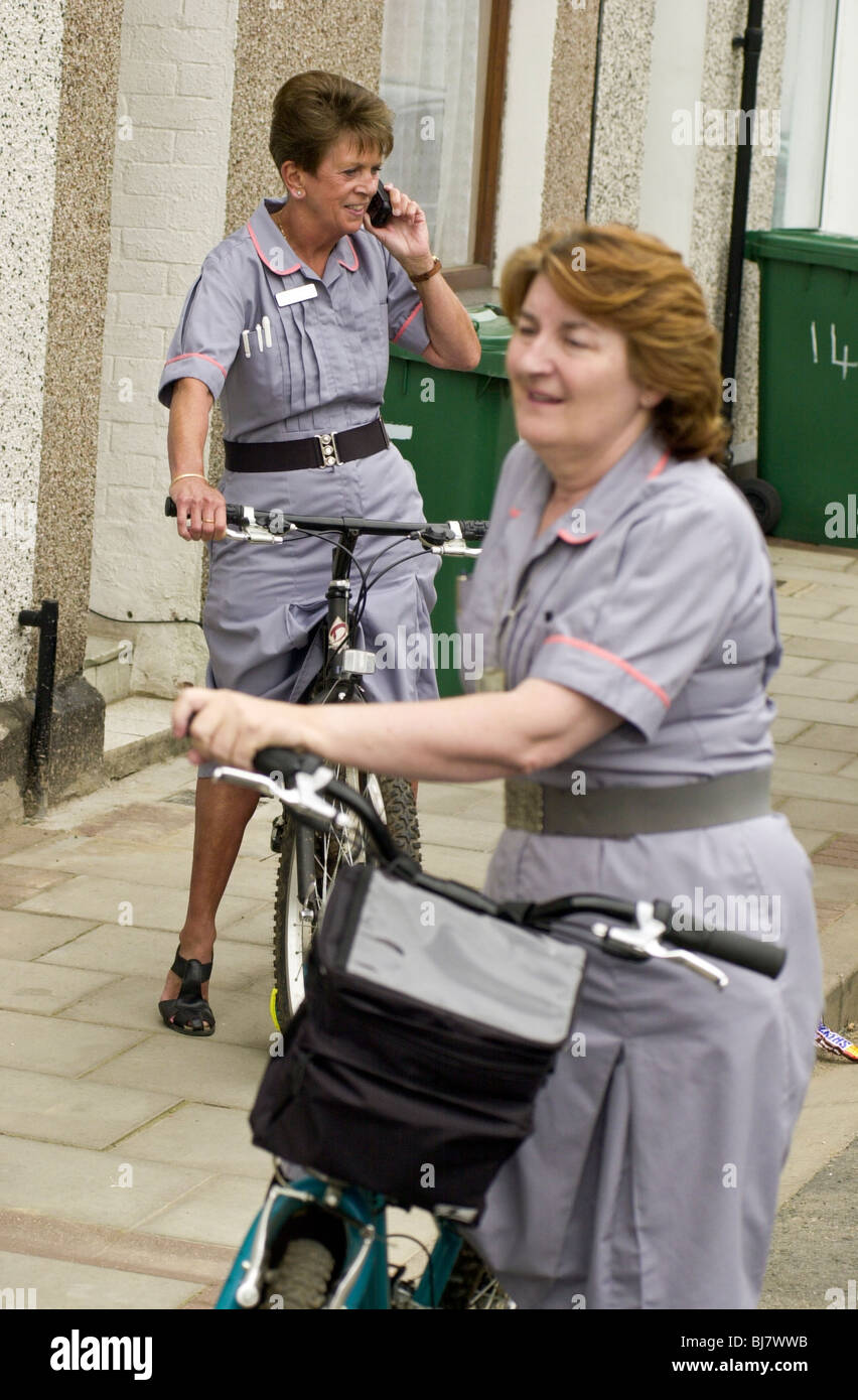 Community nurses, got on their bikes to visit housebound patients during the 2000 UK fuel crisis here in Newport South Wales UK Stock Photo
