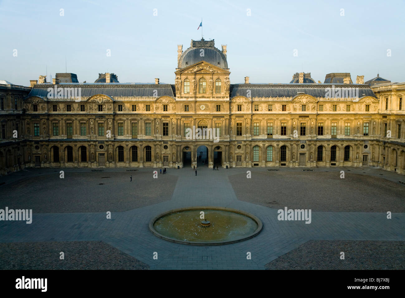 Dawn and sunrise over an internal open air courtyard of The Louvre Museum / Musee / Palais du Louvre. Paris, France. Stock Photo