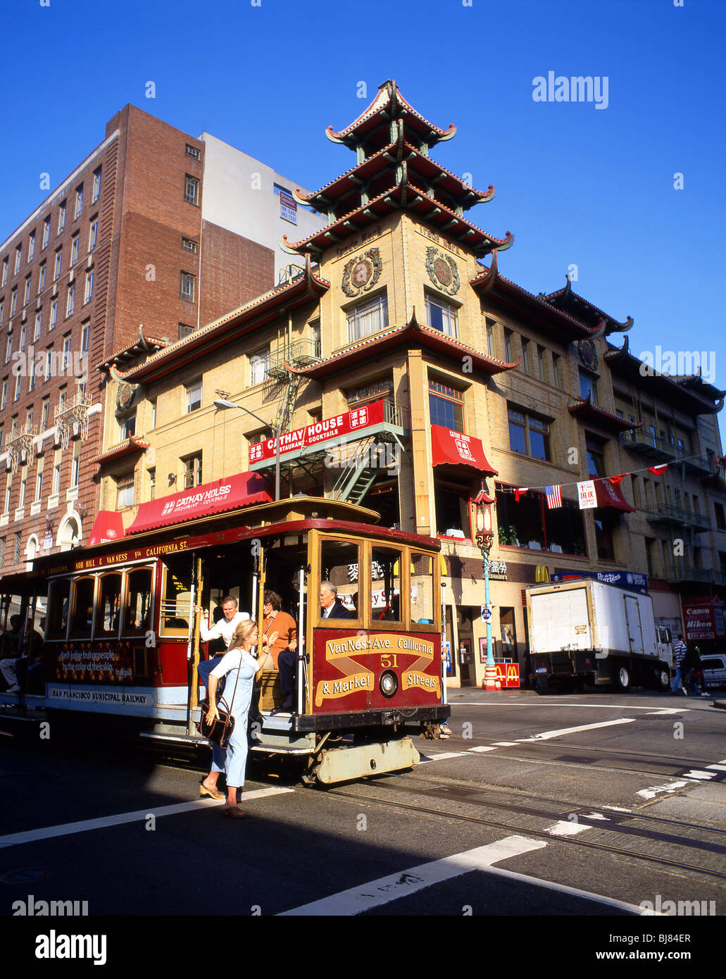 Cable car on street, Chinatown, San Francisco, California, United