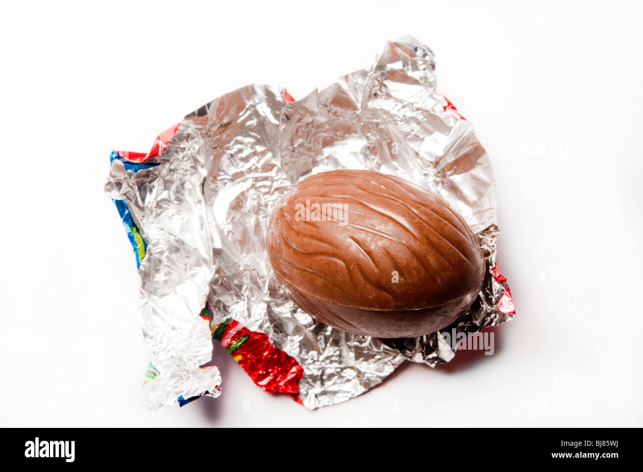 Easter chocolate egg unwrapped Stock Photo