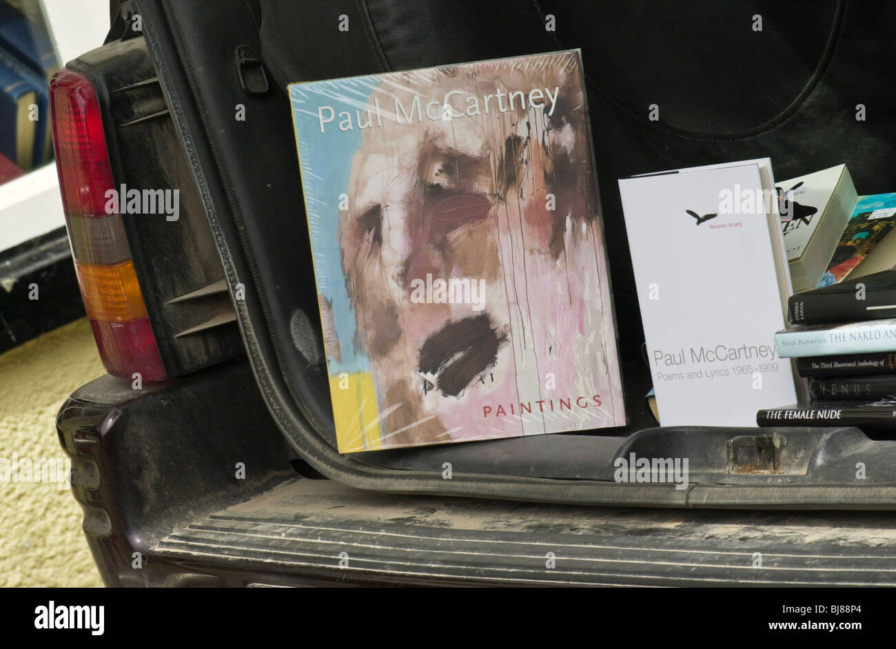 Books by Paul McCartney for sale from boot of a car when the former Beatle visited Hay Festival 2001 Stock Photo