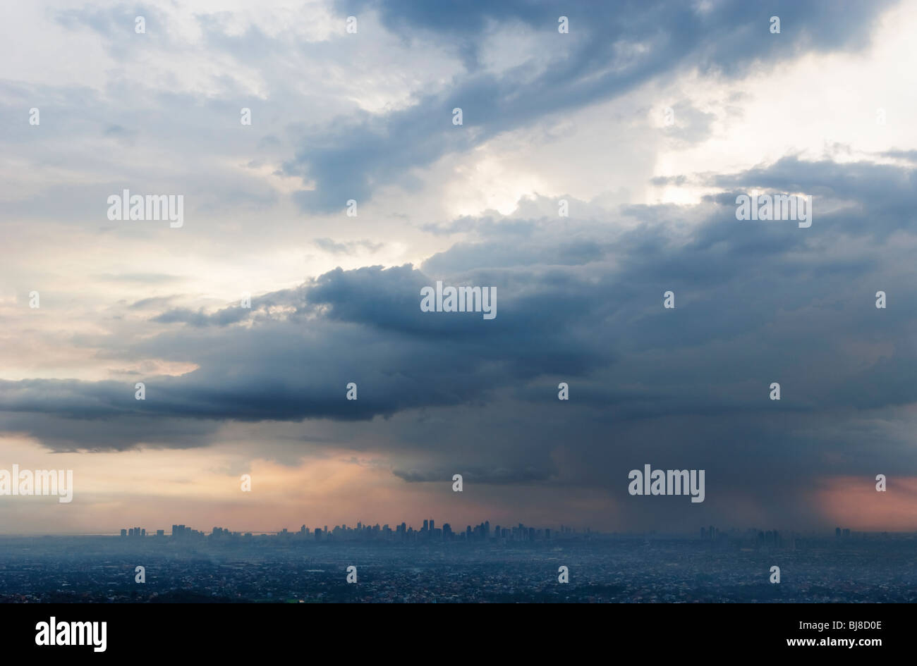 Storm clouds over city; Manila; Philippines Stock Photo