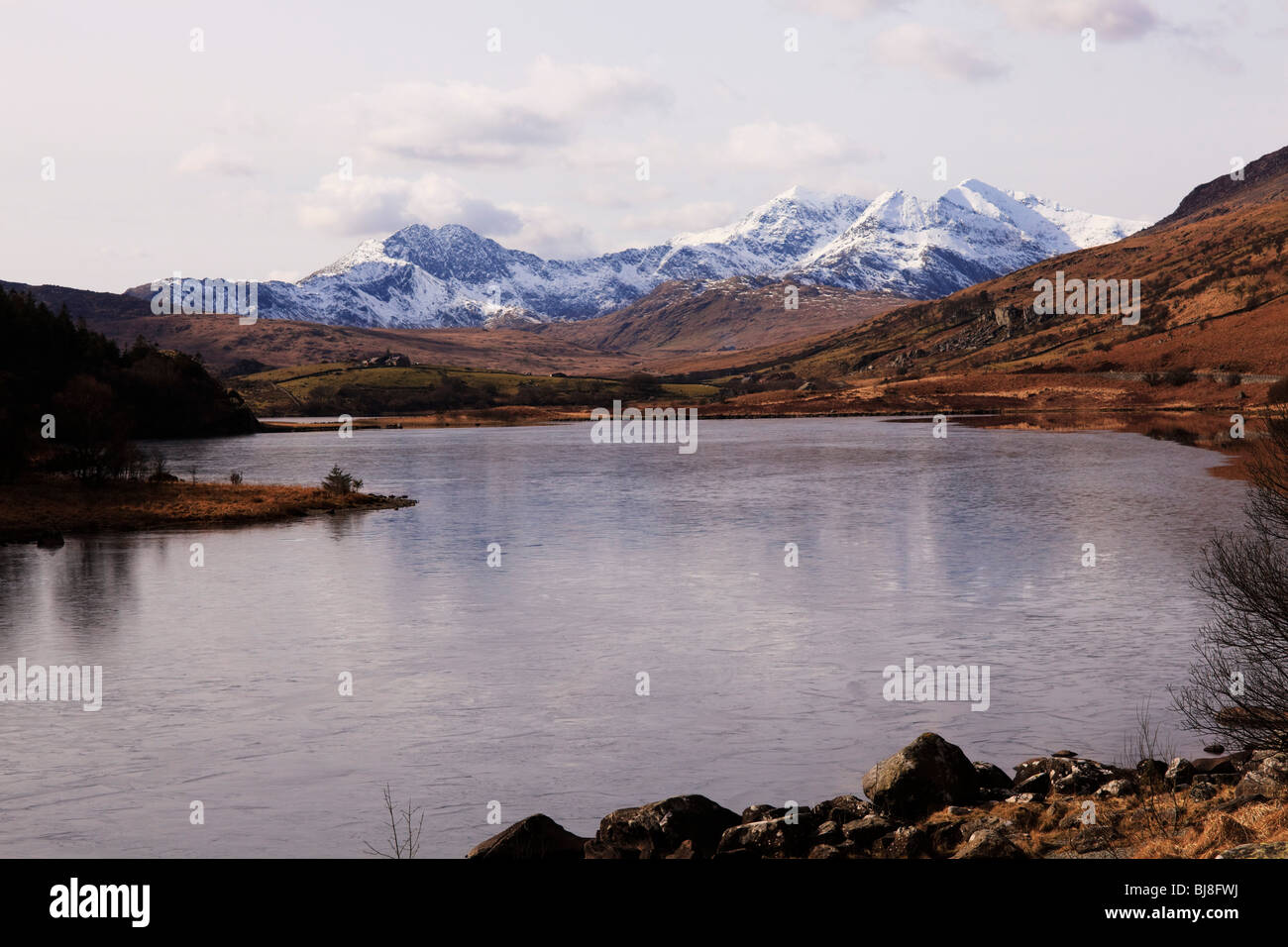 View from Capel Curig, over Llynnau Mymbyr towards Mount Snowdon, Wales Stock Photo