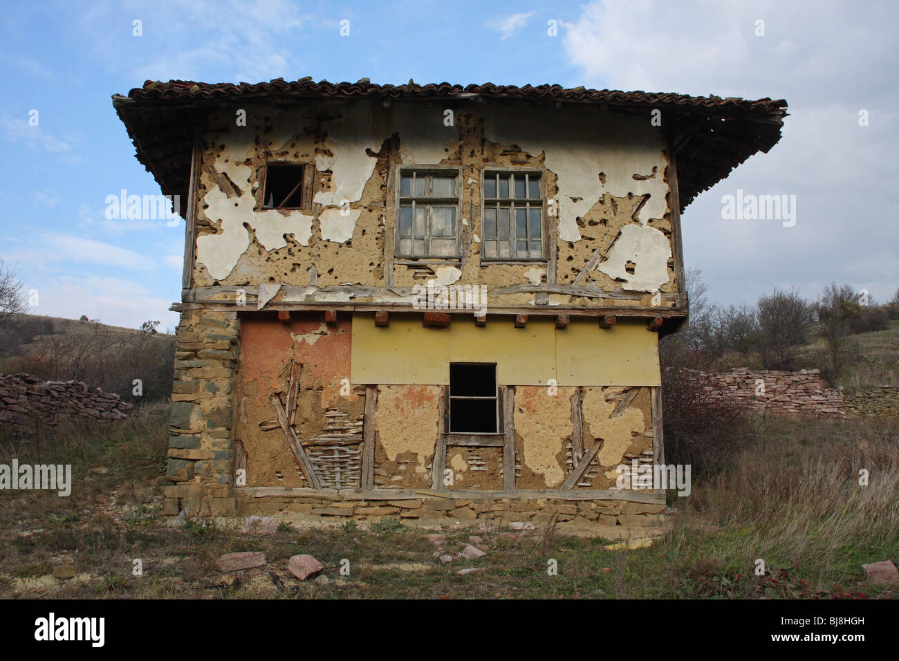 Landscape of derelict house in farmland, Bulgaria Stock Photo