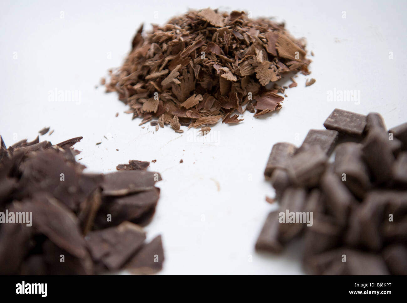 Dark and milk chocolate shavings and chunks.  Stock Photo