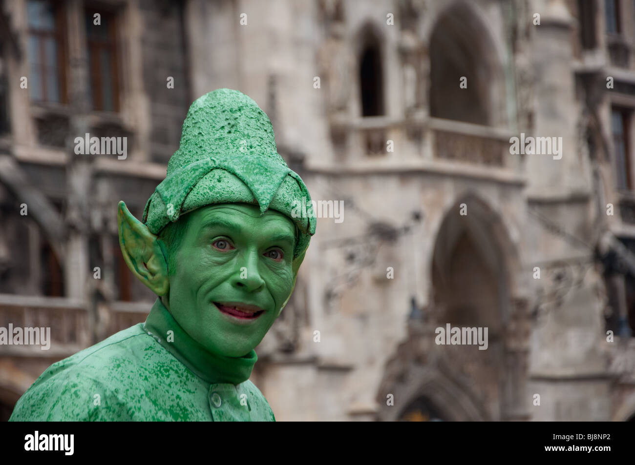 Green entertainer, Munich Stock Photo