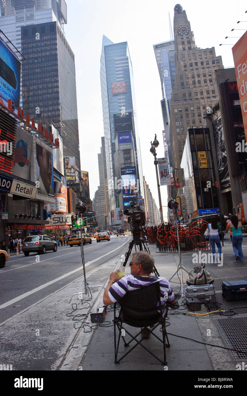 Man with a camera on Times Square, New York City, USA Stock Photo - Alamy