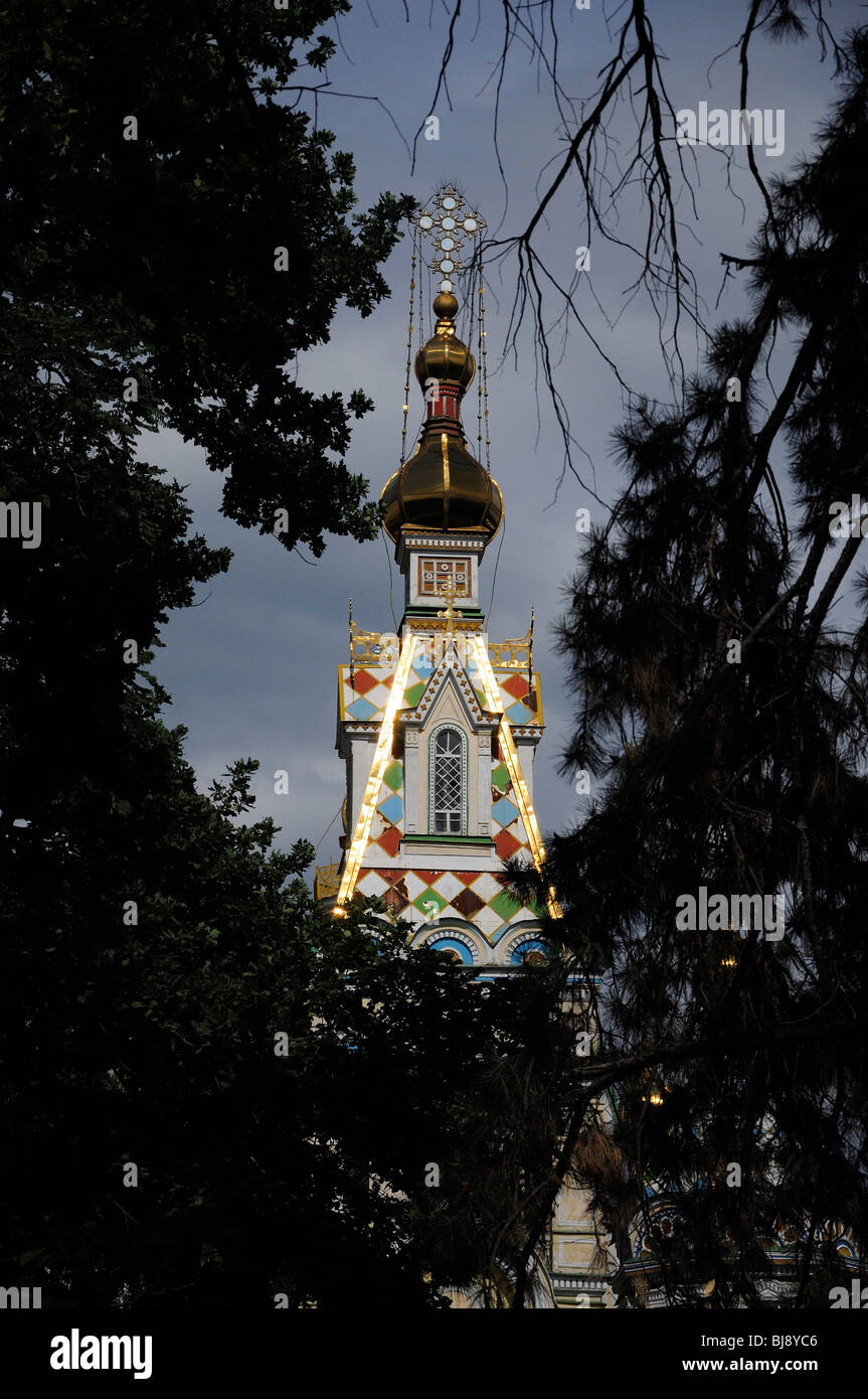 A View of the Central Spire of Almaty's Zenkov Cathedral, Viewed through the trees of Panfilov Park (Kazakhstan) Stock Photo