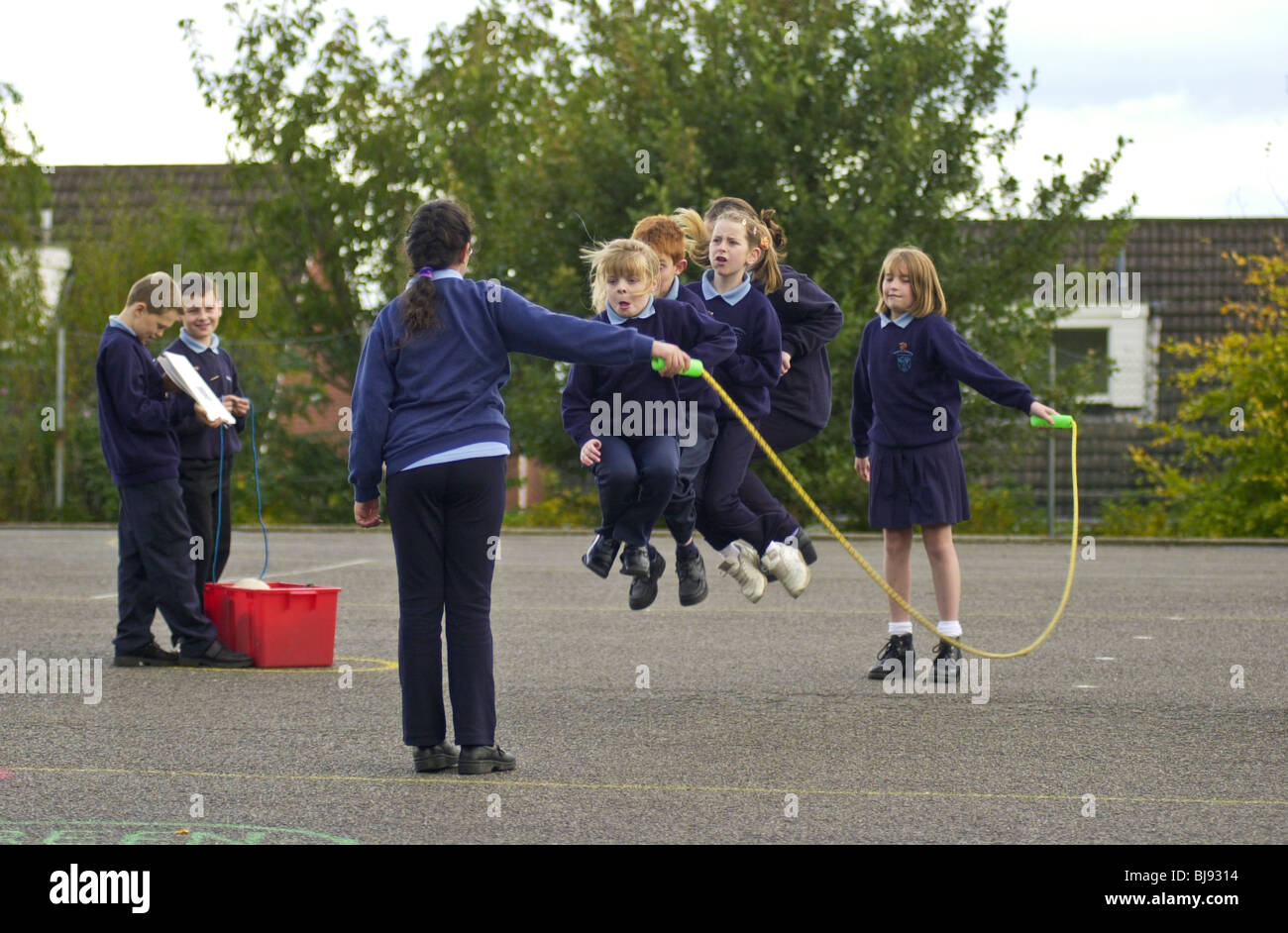 Skipping, traditional playground game being played on the schoolyard of