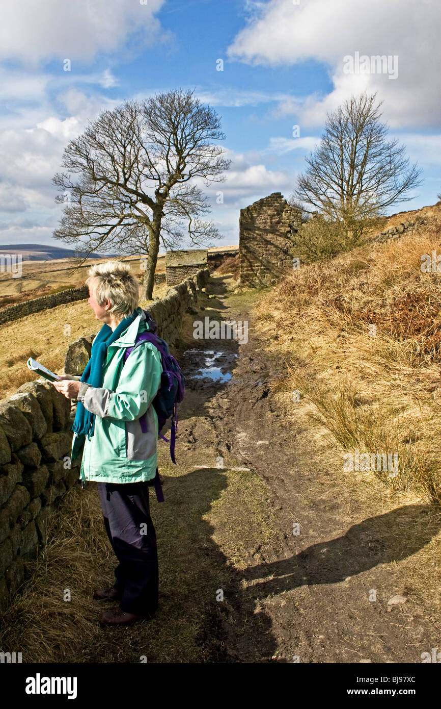Walker on Calderdale Way above Lydgate, near Todmorden, South Pennines