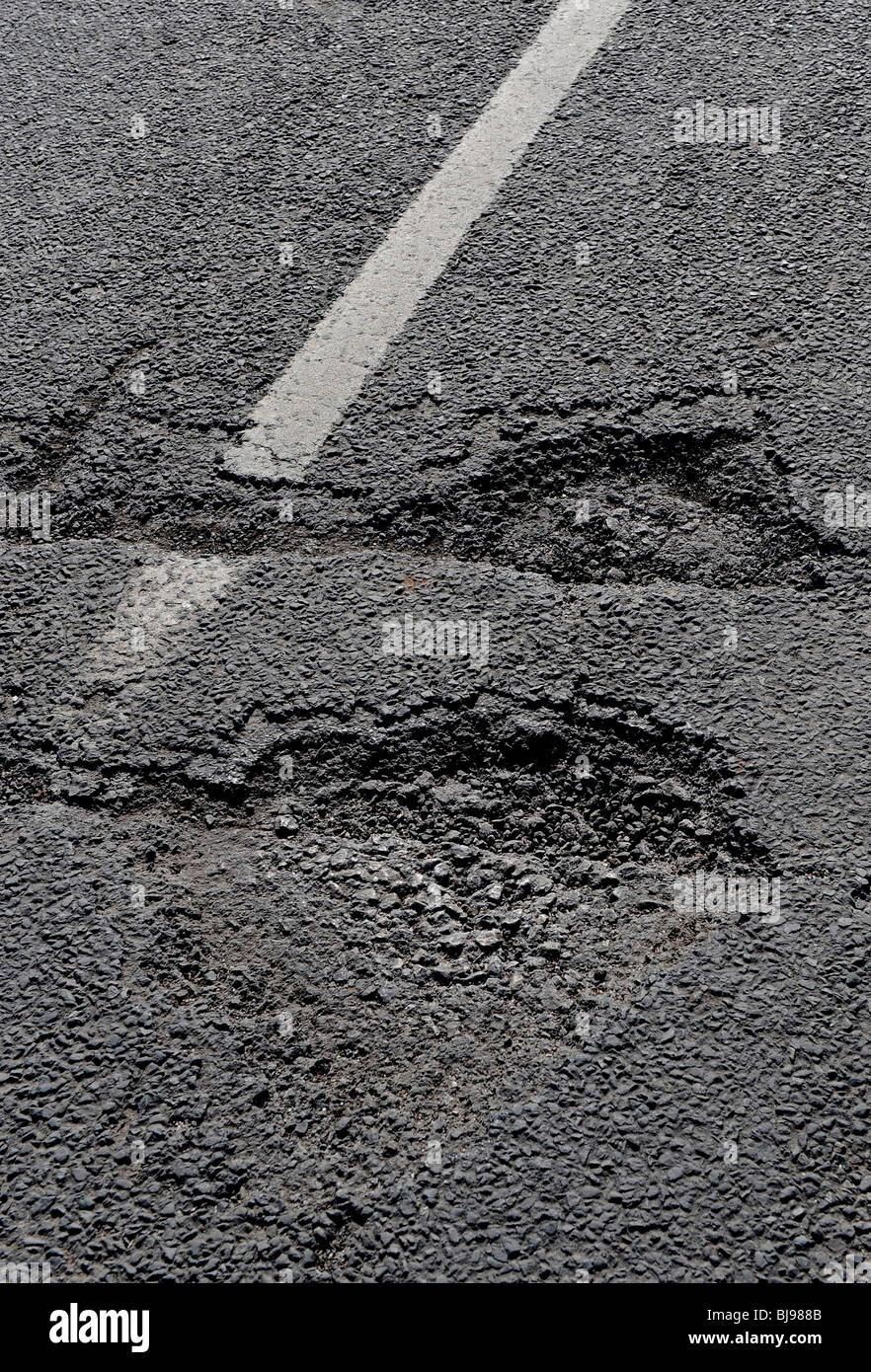 Potholes on UK roads Stock Photo