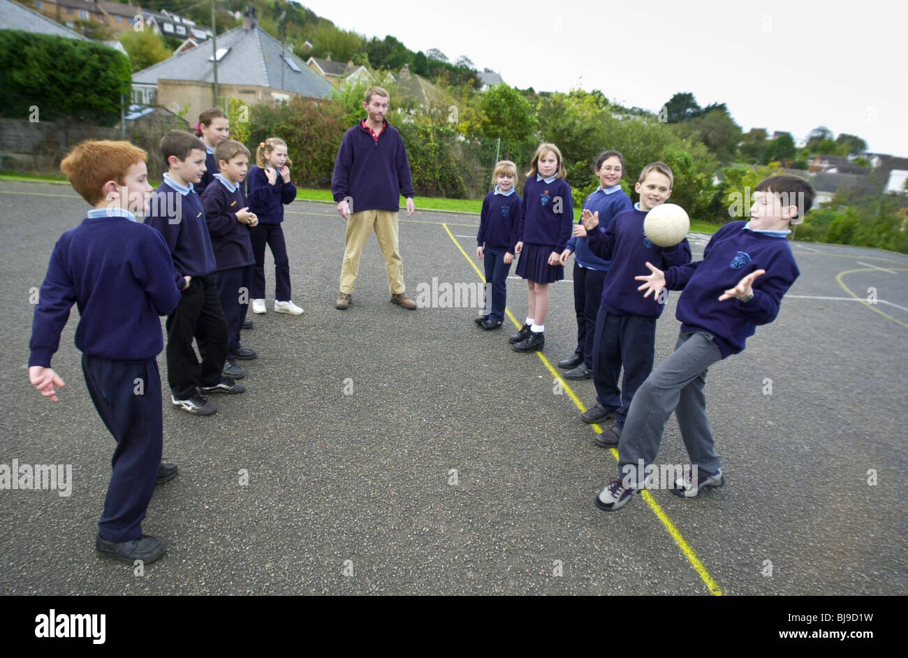 "catch don't catch" traditional playground ball game being played on