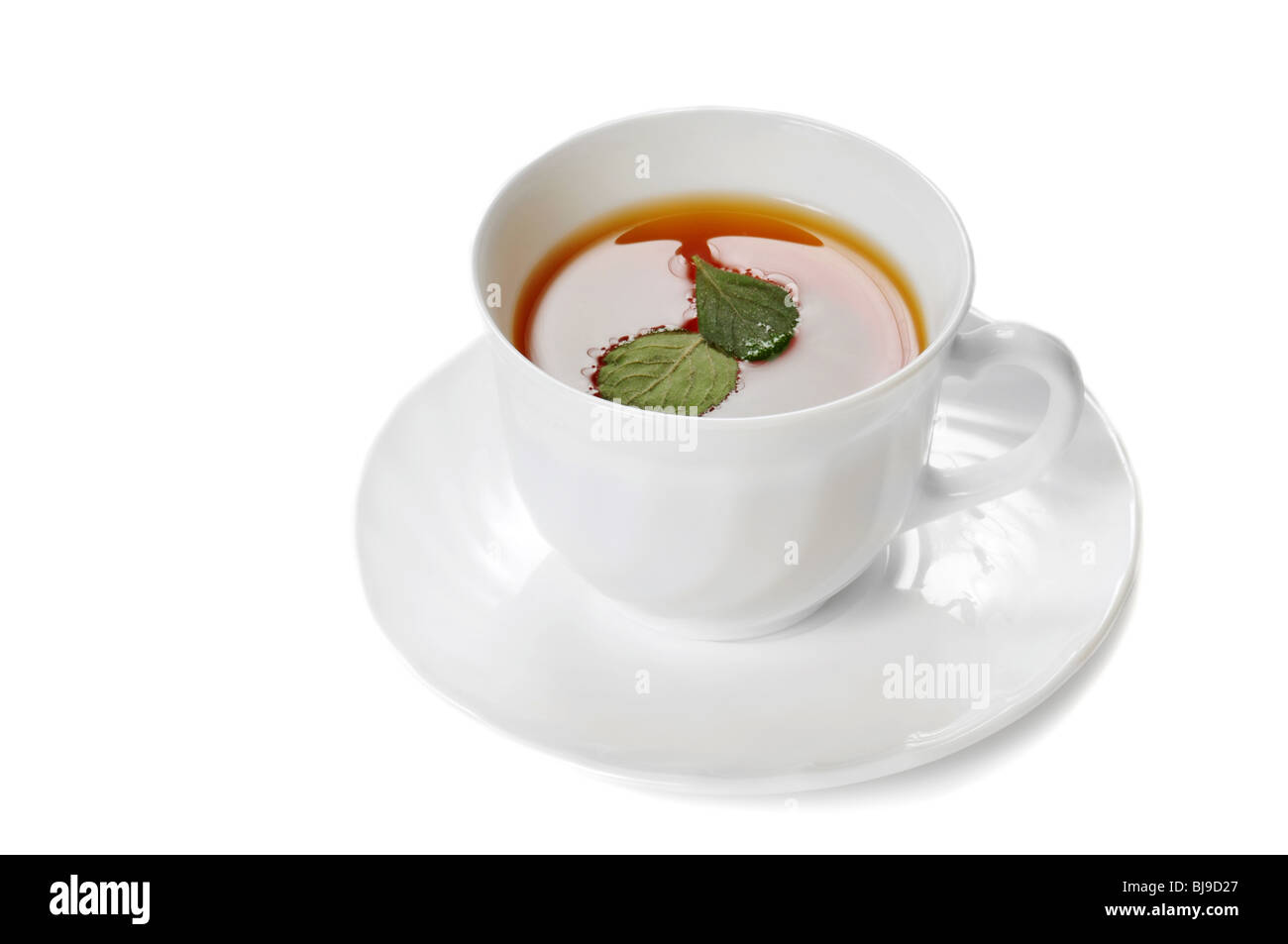 herbal tea in cup isolated over white Stock Photo