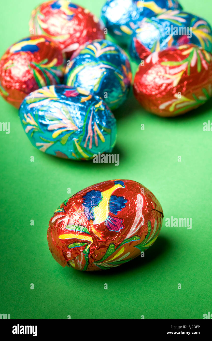 Easter chocolate eggs wrapped in color paper Stock Photo