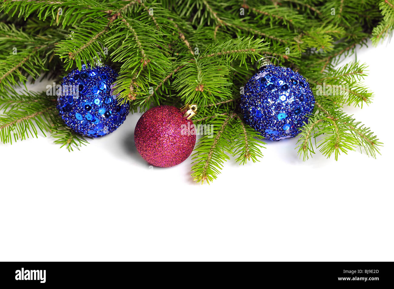 Christmas ornament with spheres and pine branches on a white background Stock Photo
