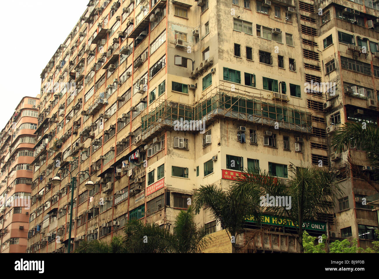 Small apartment buildings densely populated in Hong Kong downtown Chinese neighborhood Stock Photo