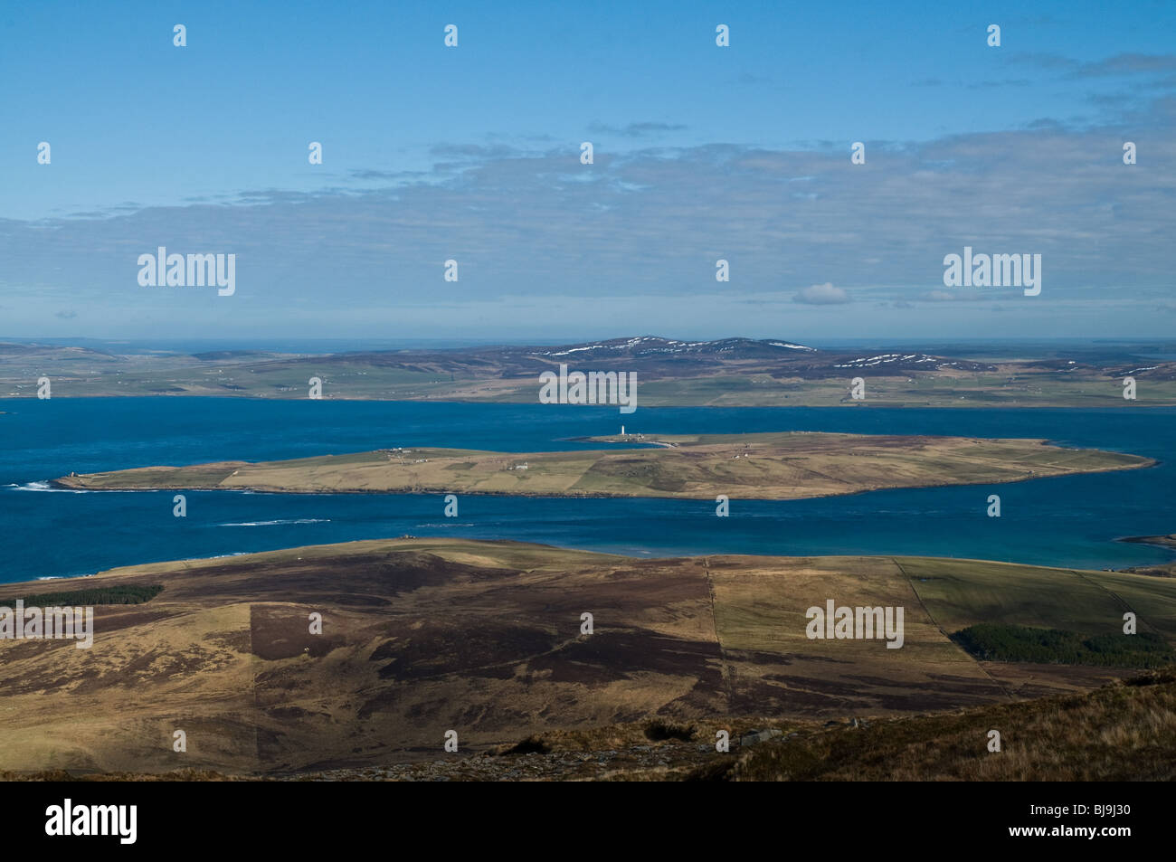 dh  GRAEMSAY ORKNEY View of Graemsay island and Orkney mainland from Cuilags Hoy hills scapa flow landscape scottish islands Stock Photo