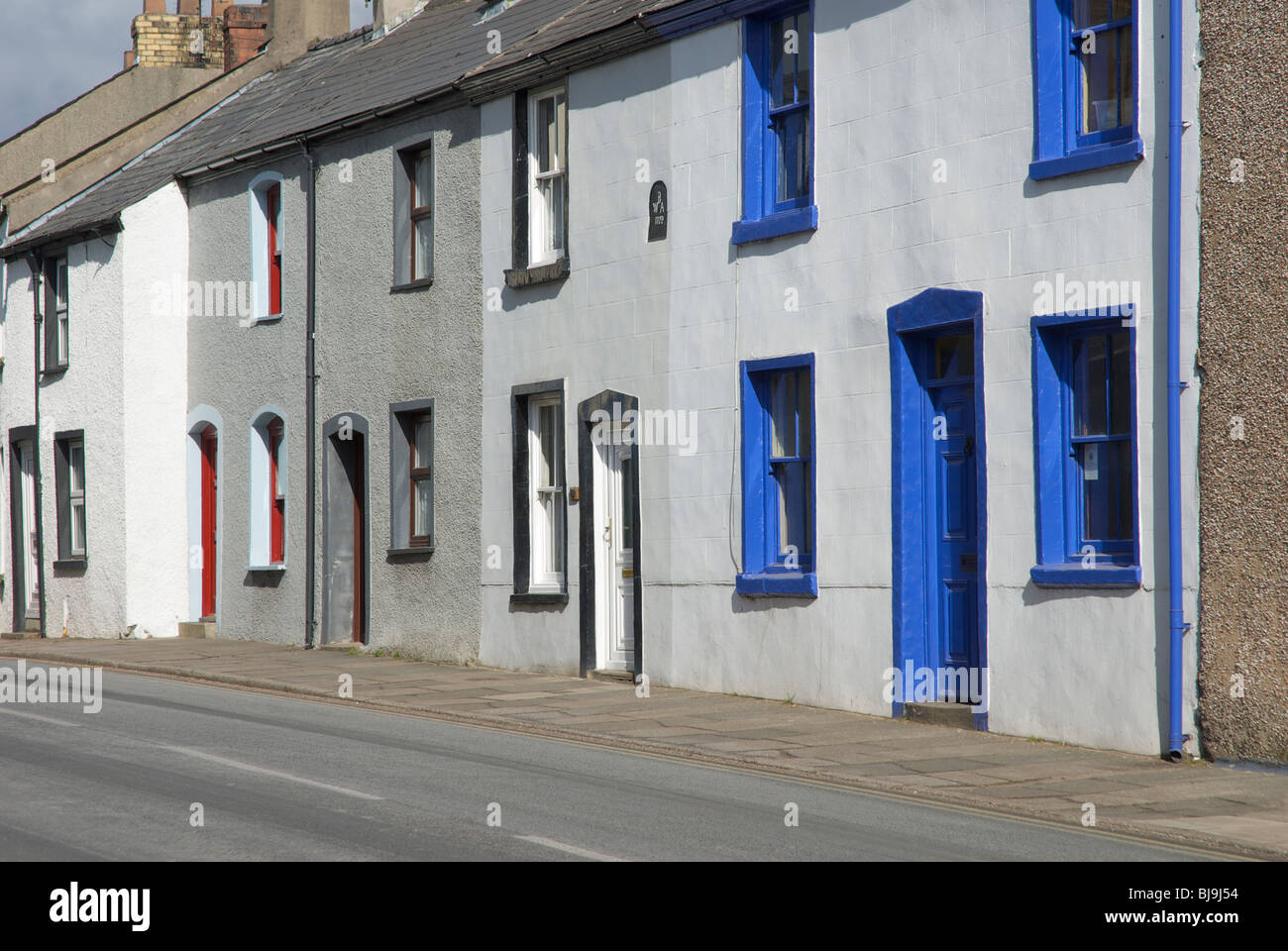 Colourful terraced houses on Soutergate, Ulverston, Cumbria, England UK