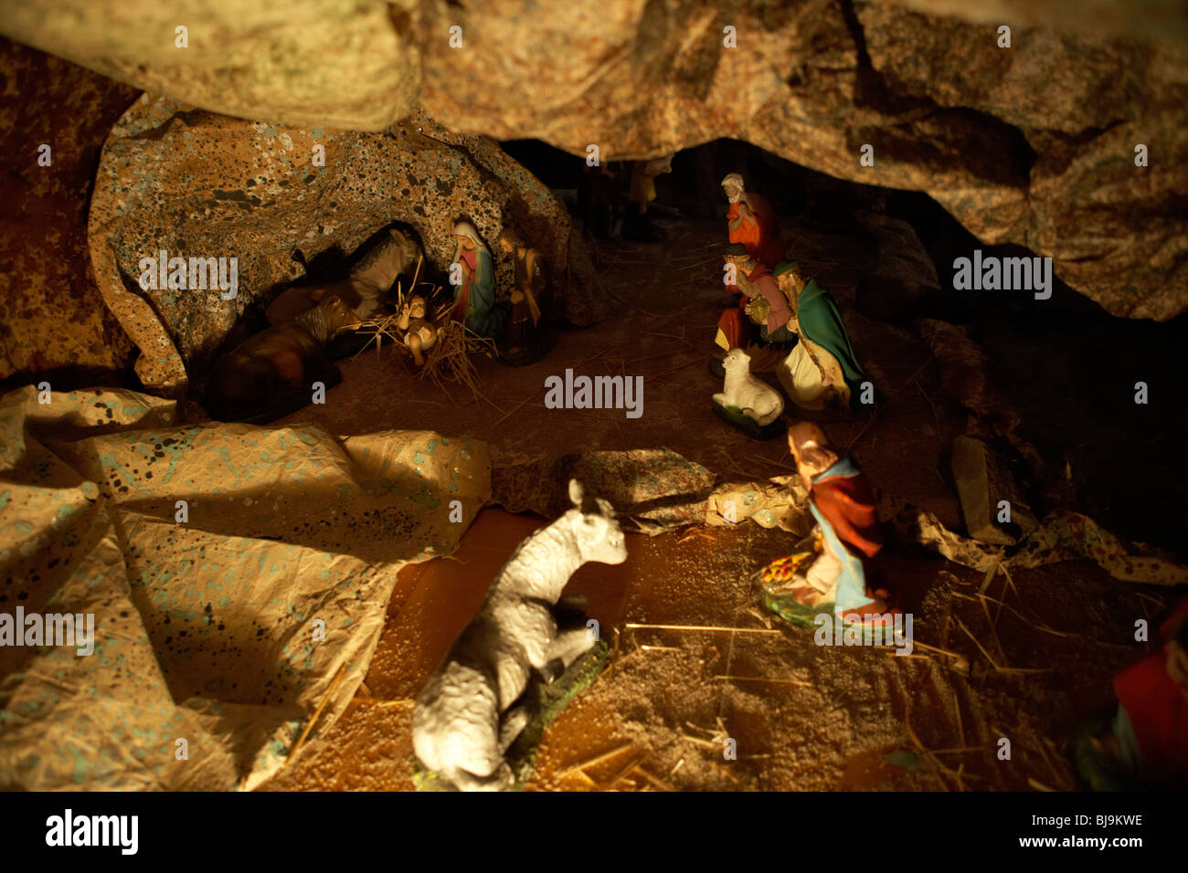 nativity scene in the rocks below the basilica of the holy sacrament