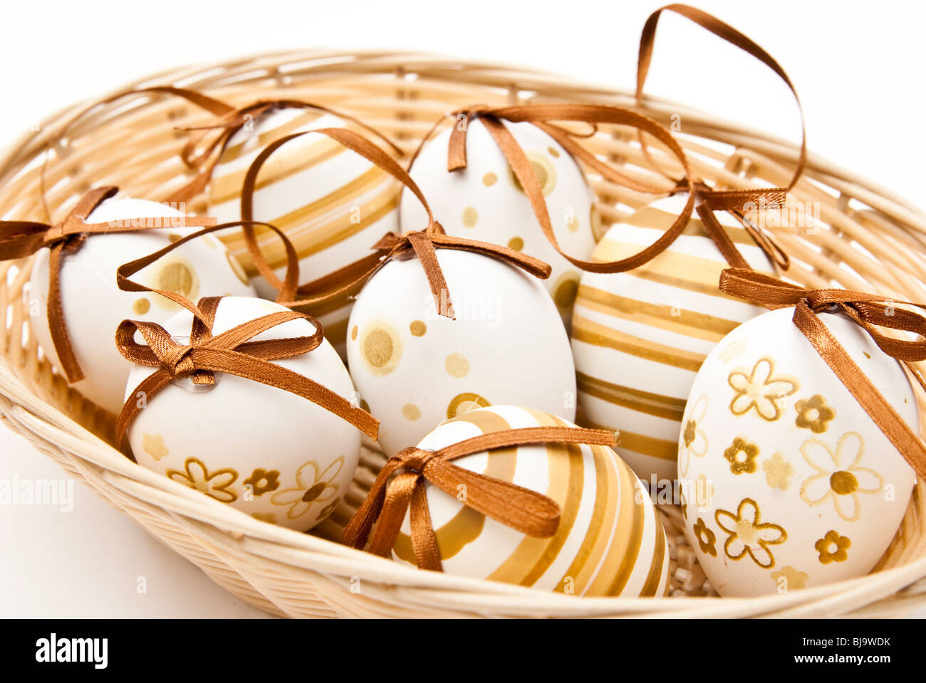 easter eggs in wicker basket Stock Photo - Alamy