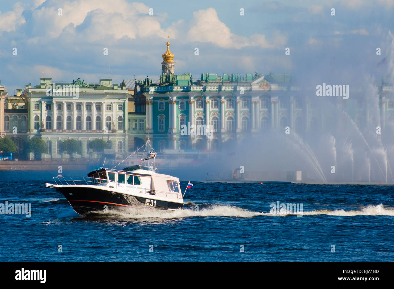 Motor-boat and fountains in the River Neva, St Petersburg, Russia, with the Winter Palace, now part of the Hermitage Museum Stock Photo